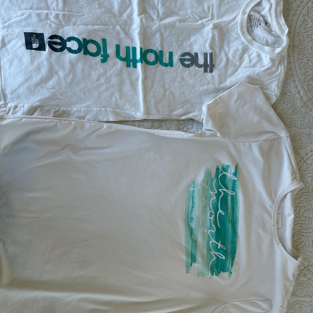 Two the north face white t shirts xs